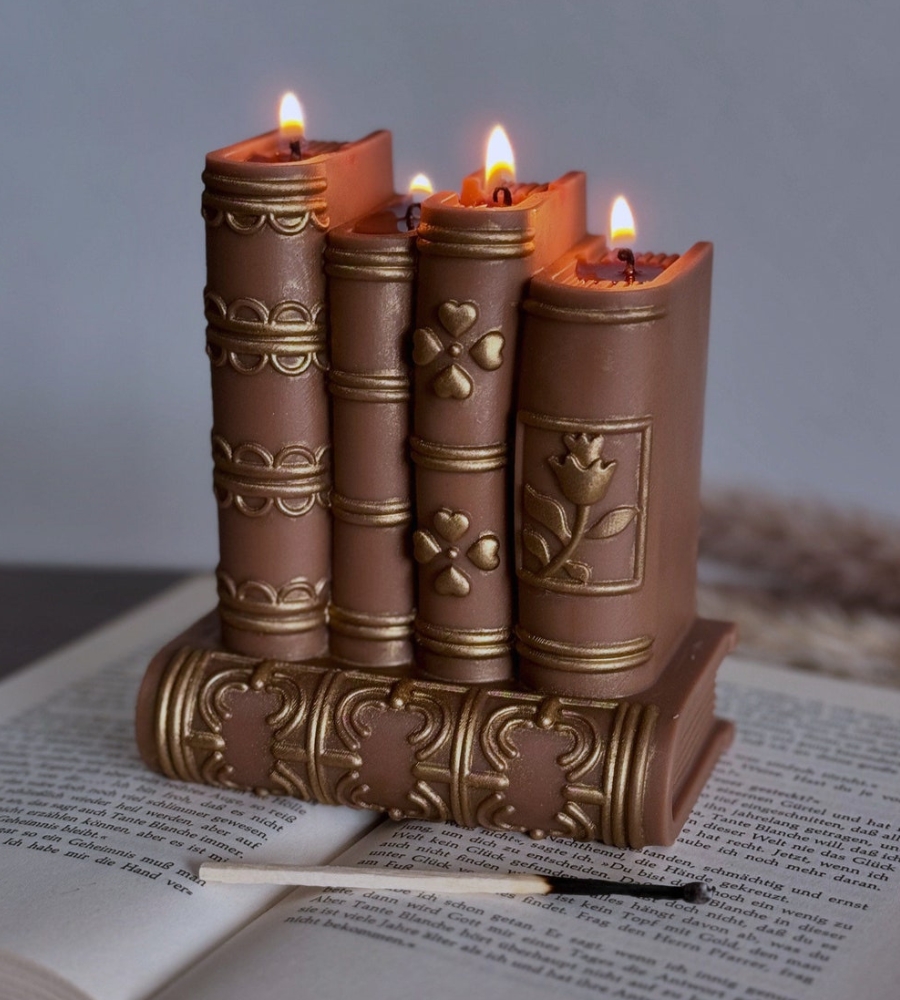 Guia de presentes para fãs de Harry Potter: uma vela peculiar, em forma de livros - um lindo e especial presente que vai impressionar
