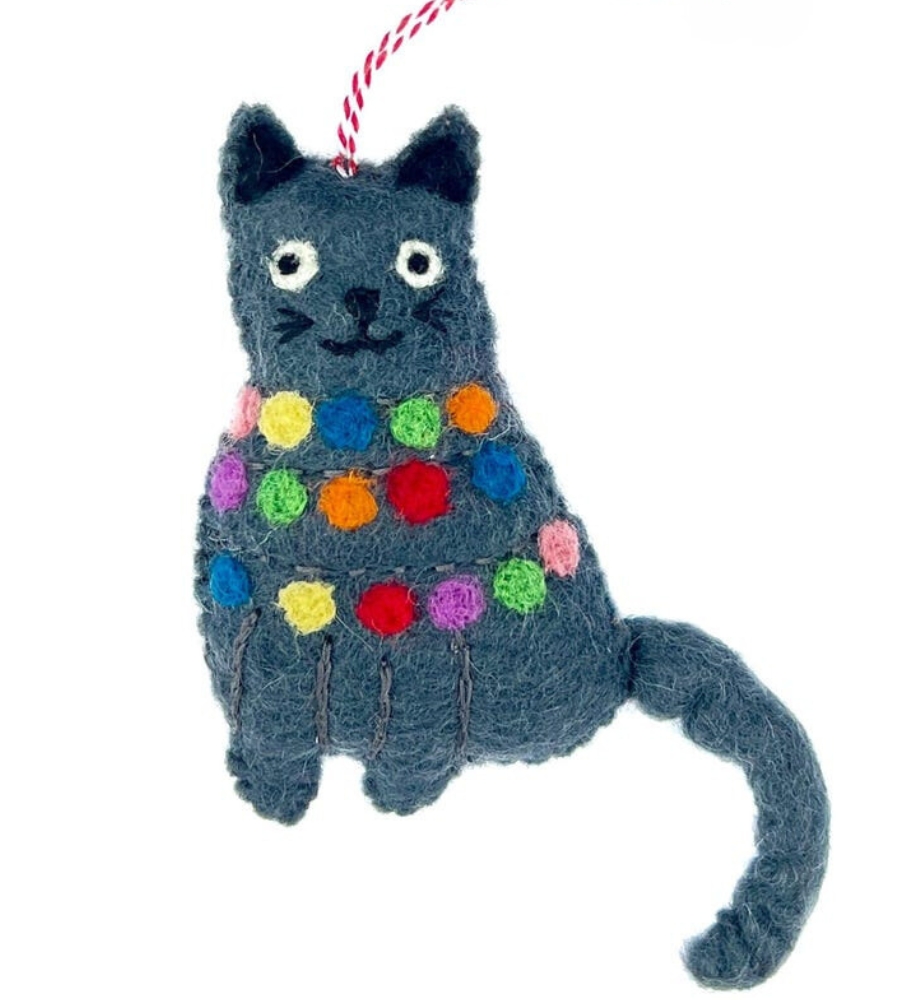 TOP Ornamentos de Natal, presentes únicos: um enfeite de Natal de feltro. Indeed, a very special ornament.