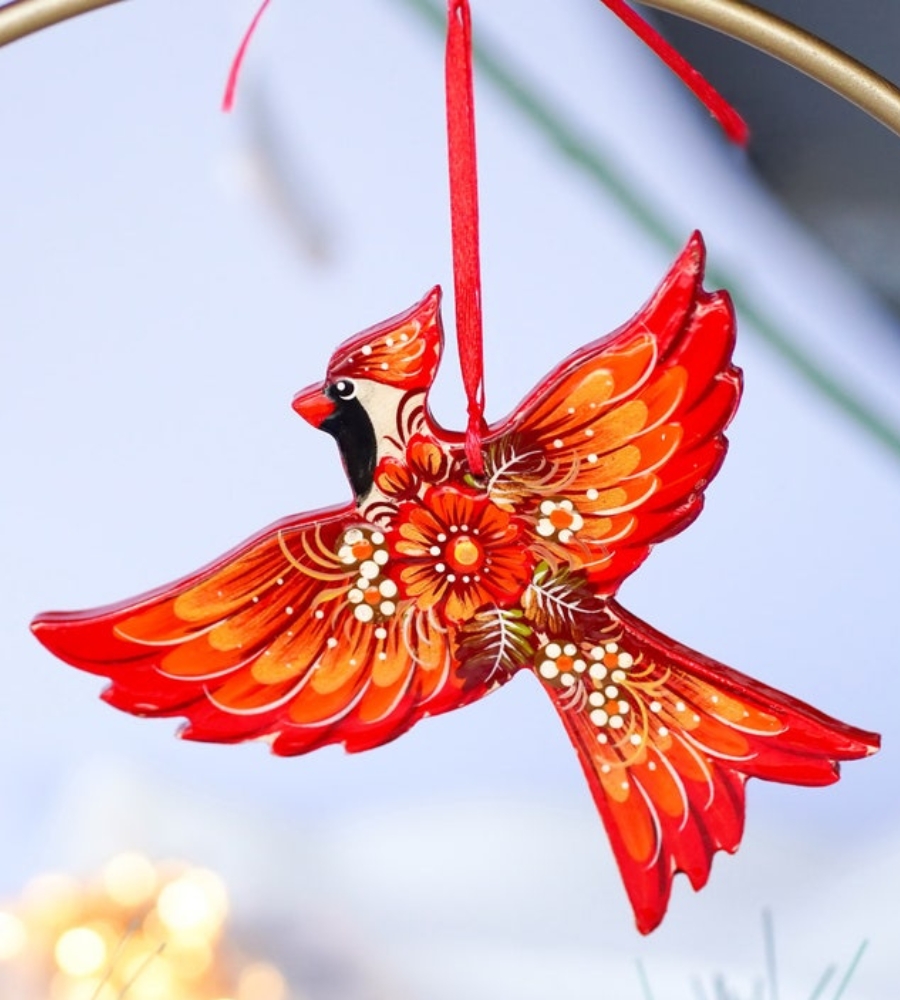TOP Ornamentos de Natal, presentes únicos: fénix pintada à mão em madeira. Indeed, a very special ornament.